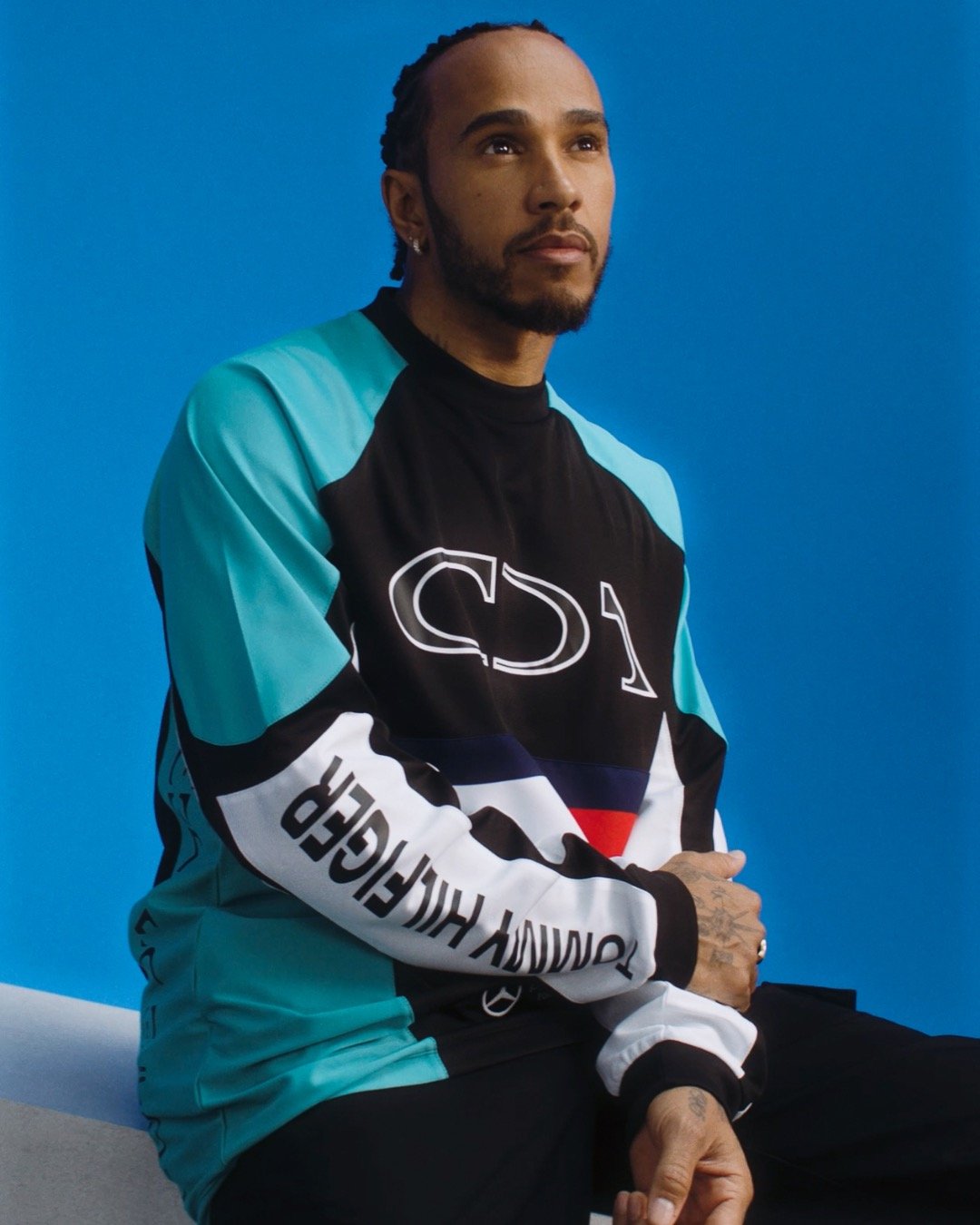 We linked up with Lewis Hamilton and George Russell to talk about the new Tommy Hilfiger x Mercedes-AMG F1 x Clarence Ruth collab