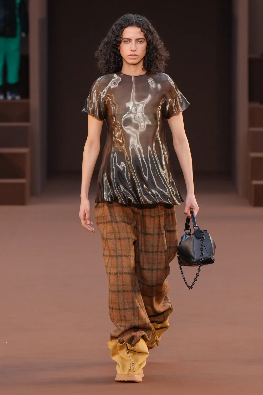 LOEWE 'CAR-DRESS' CAUSE CHAOS AT FW22 SHOW