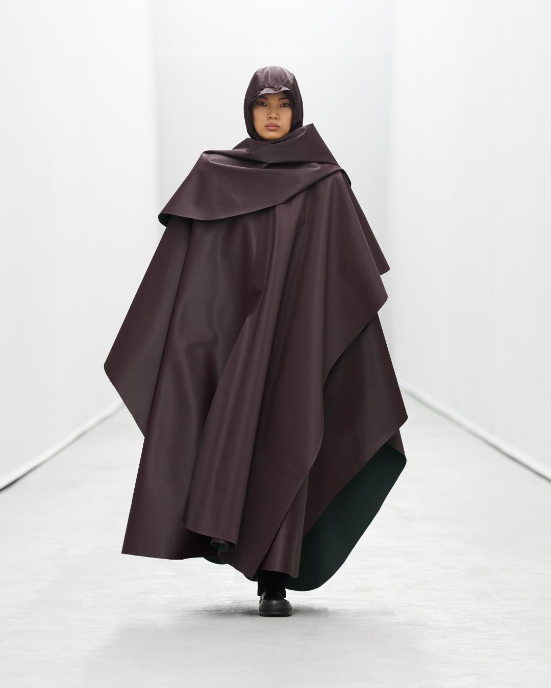 Rains threw a runway show at their new office