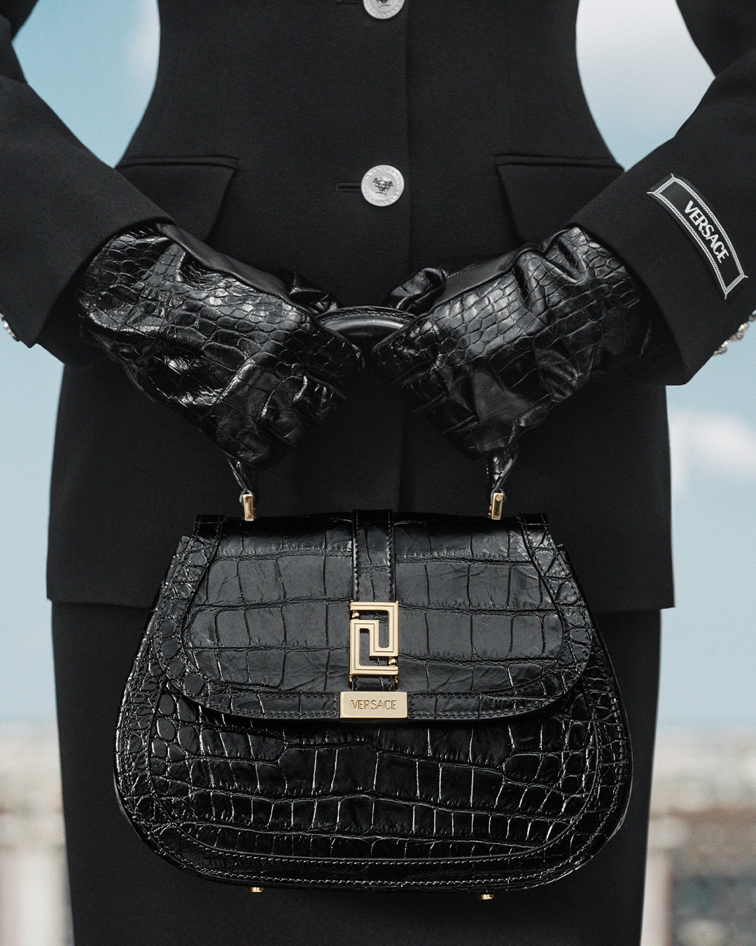 The Versace Greca Goddess top handle bag is from a higher being