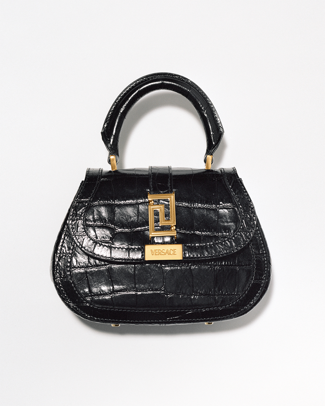 The Versace Greca Goddess top handle bag is from a higher being
