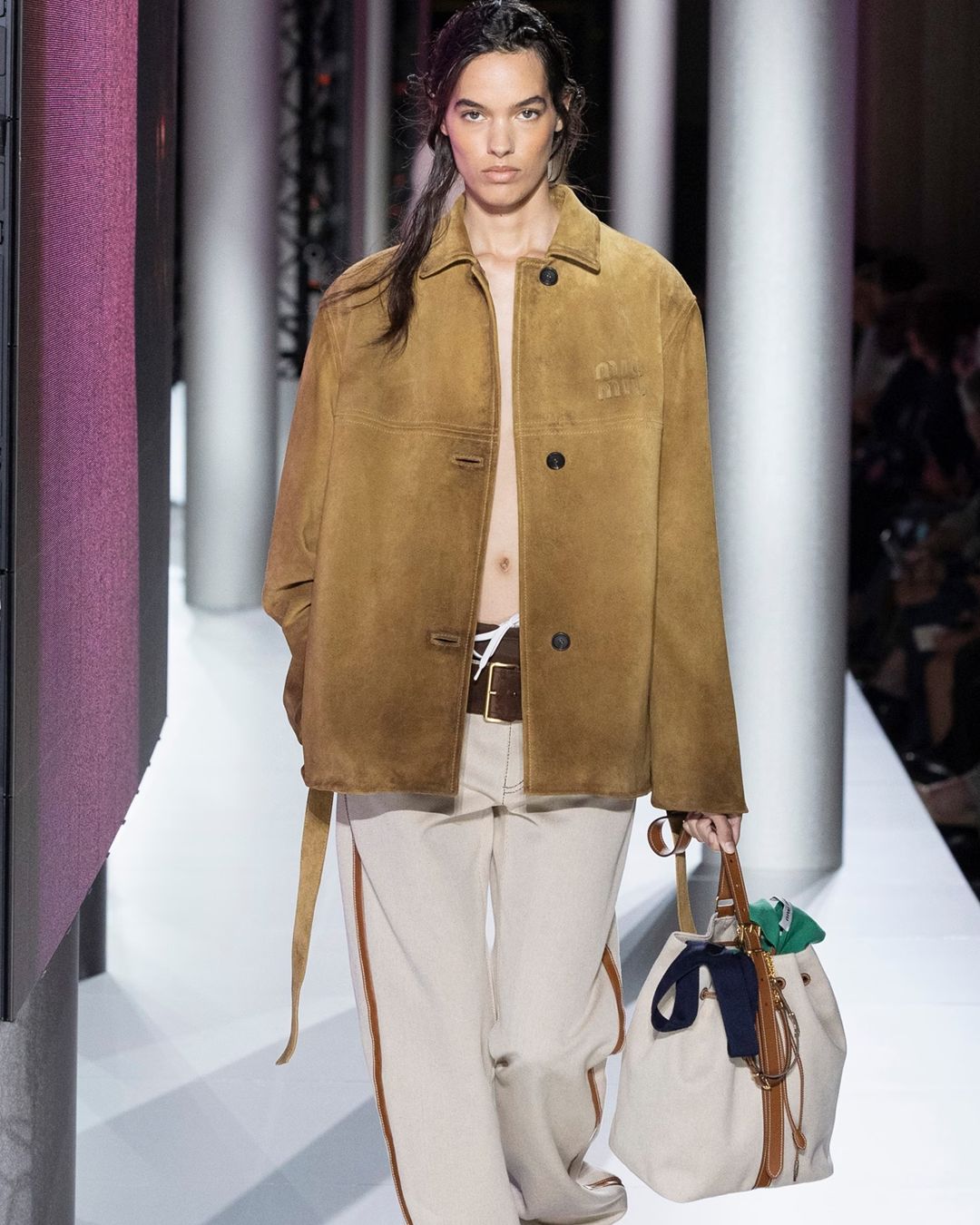 Miu Miu clocked off work and got caught in the rain for SS24