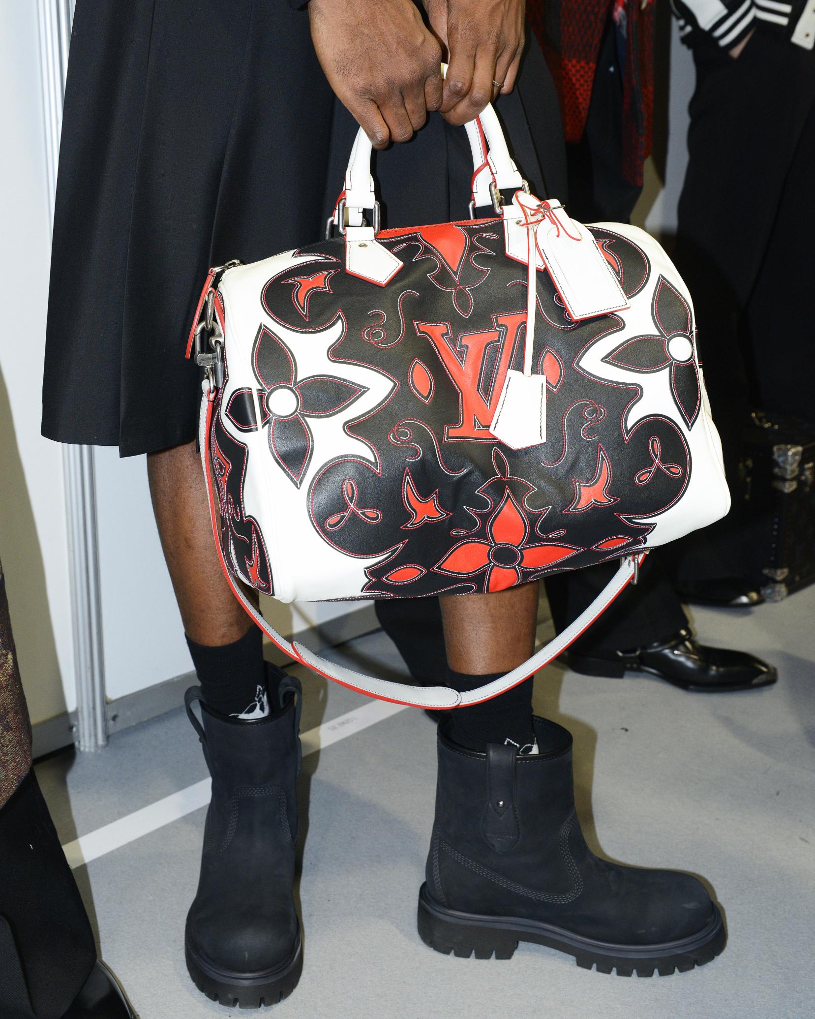 Around the World: Paris Fashion Week & Kid Cudi puts up sculptures for INSANO