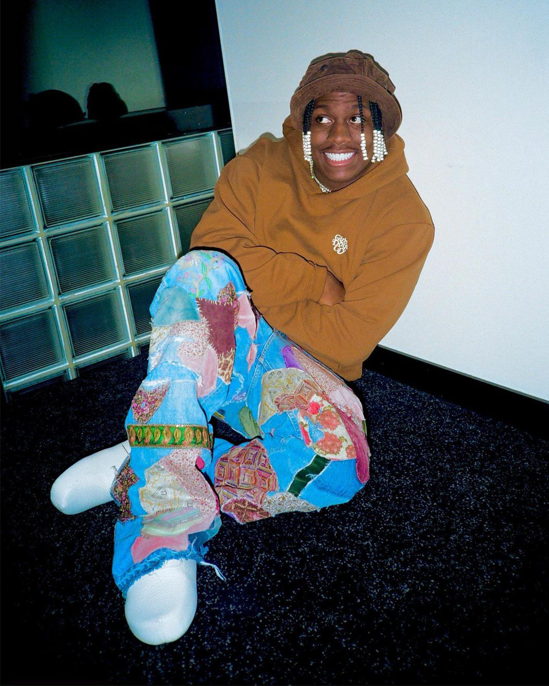 FROM BRAIDS, TO STREETWEAR, TO DESIGNER BRANDS: THIS IS THE EVOLUTION OF LIL YACHTY'S STYLE